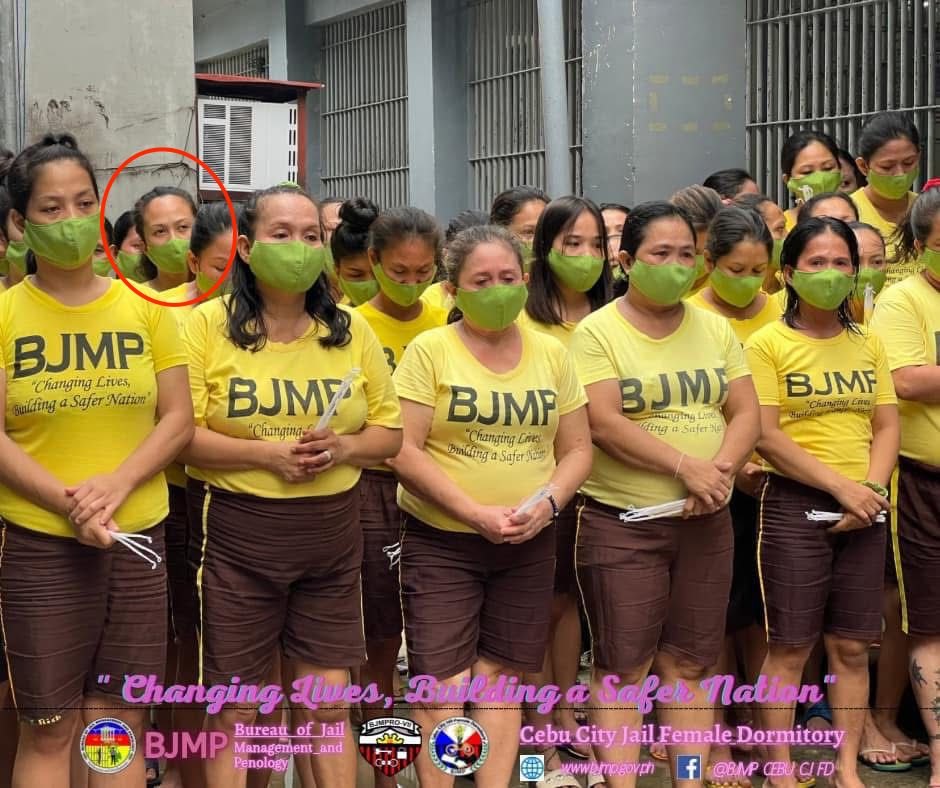 Lovely, circled, lined up with other women at the jail